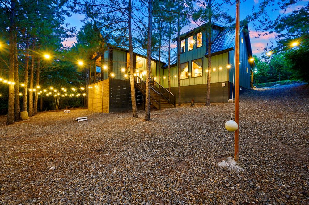String lights across the back yard at dusk