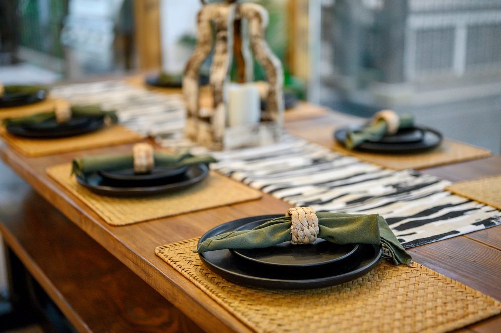 Dining table set for dinner
